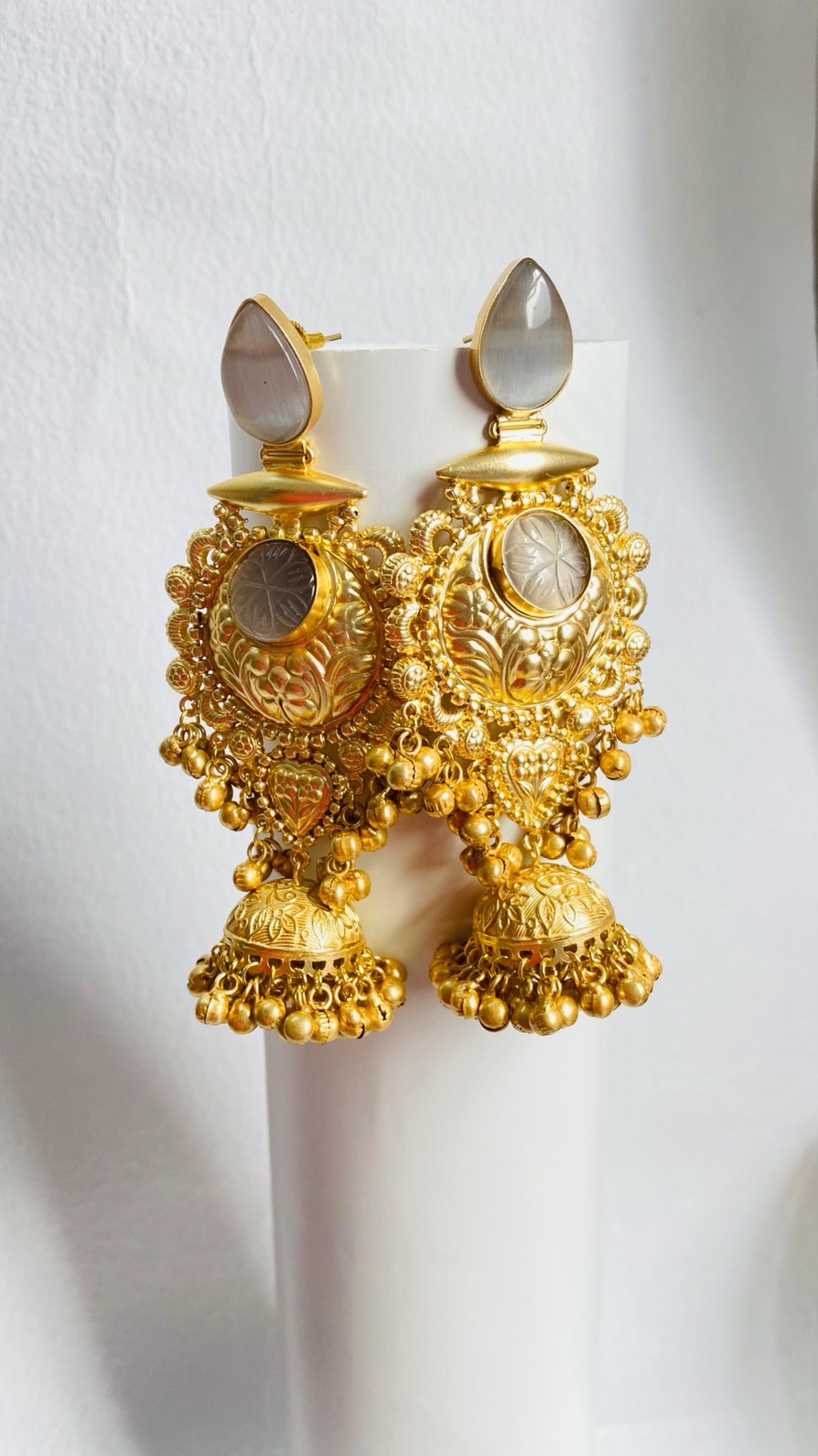 Timeless gold-plated jhumka earrings with intricate detailing and a regal touch. - Image 5