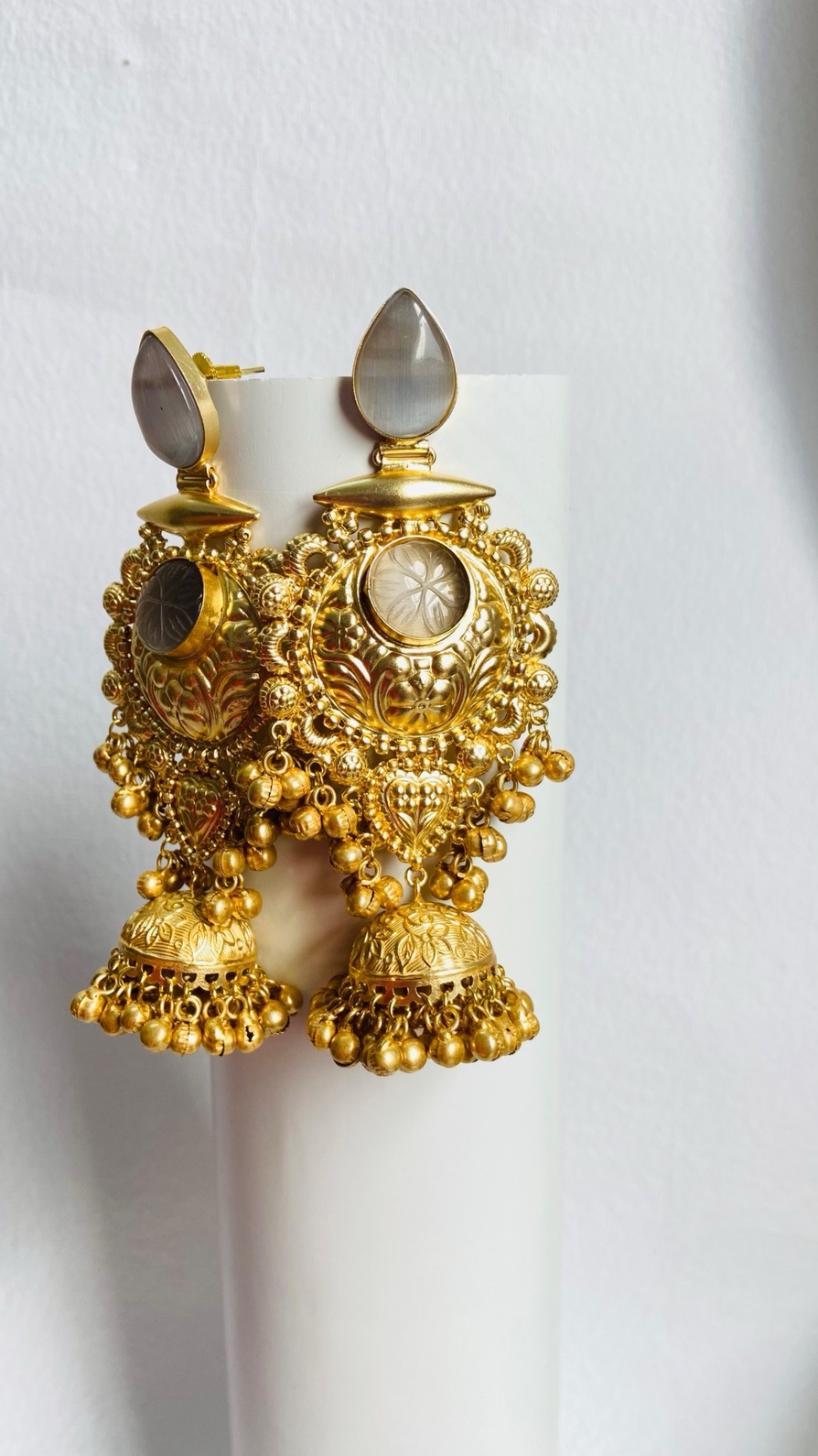 Timeless gold-plated jhumka earrings with intricate detailing and a regal touch. - Image 4