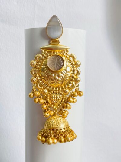 Timeless gold-plated jhumka earrings with intricate detailing and a regal touch.