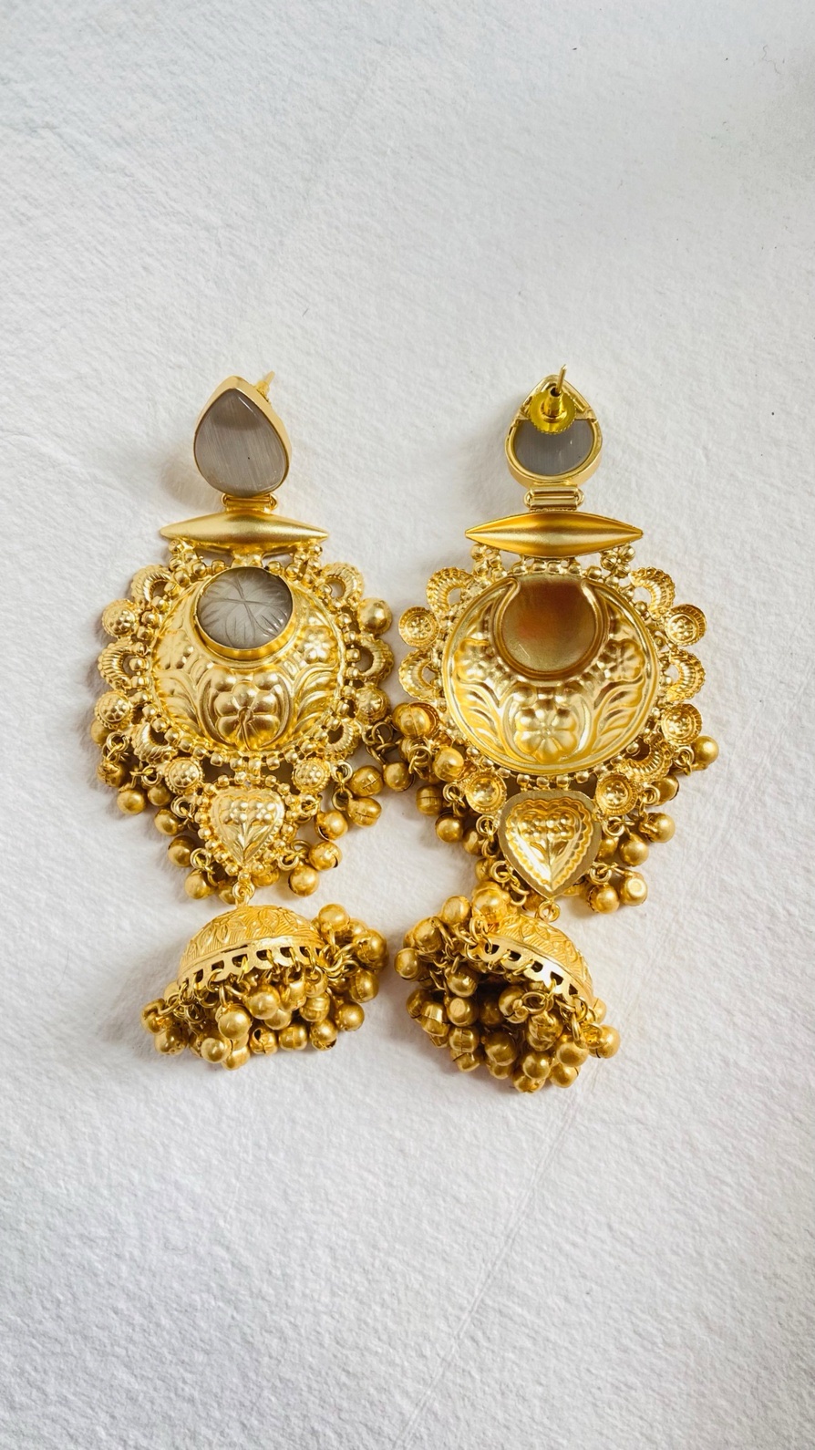 Timeless gold-plated jhumka earrings with intricate detailing and a regal touch. - Image 2