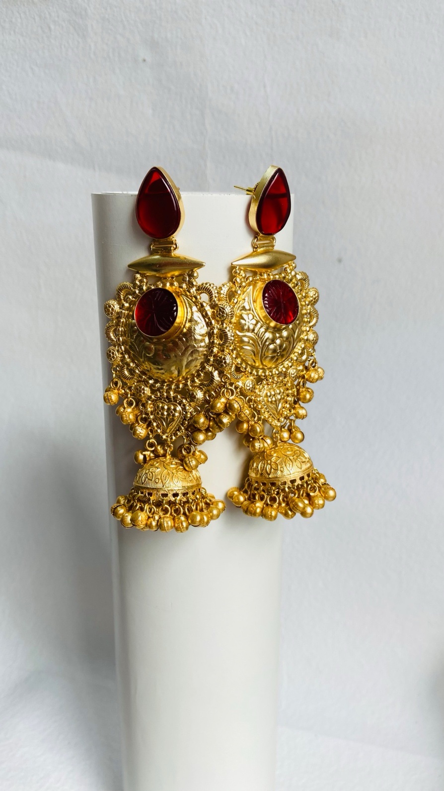 Timeless gold-plated red jhumka earrings with intricate detailing and a regal touch. - Image 2