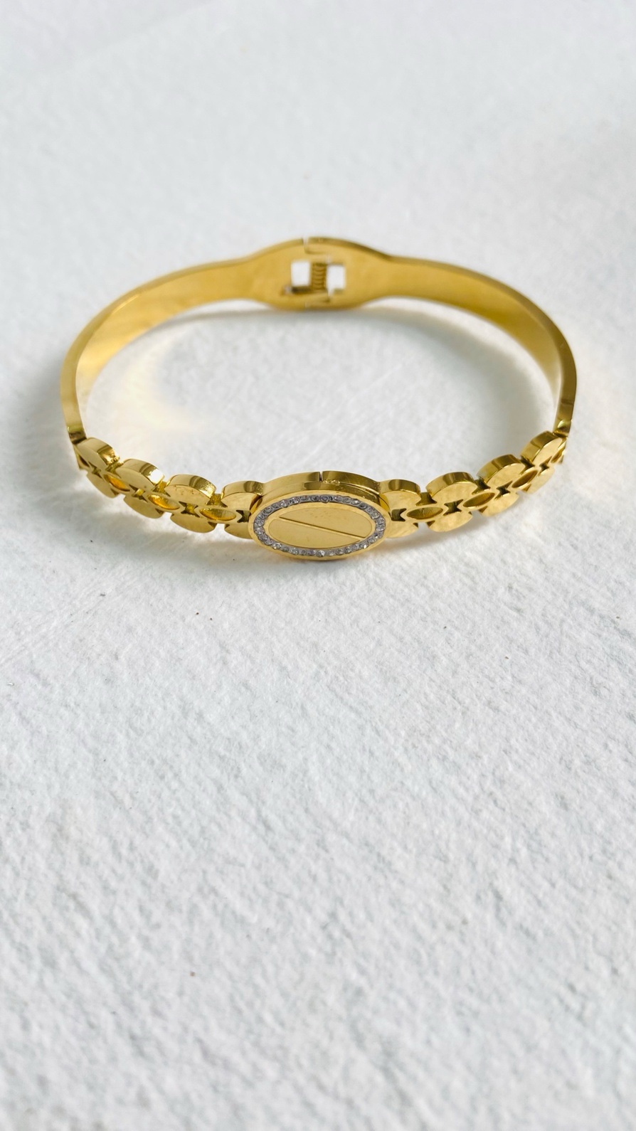 Elegant gold-plated bracelet with a contemporary design and shimmering accents. - Image 4