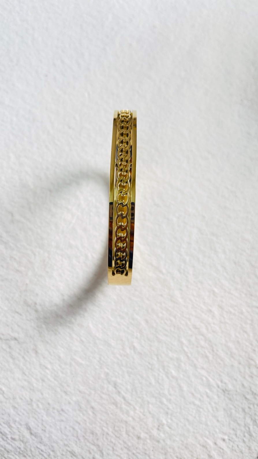 Sleek gold bangle with an intricate chain-link design - Image 3