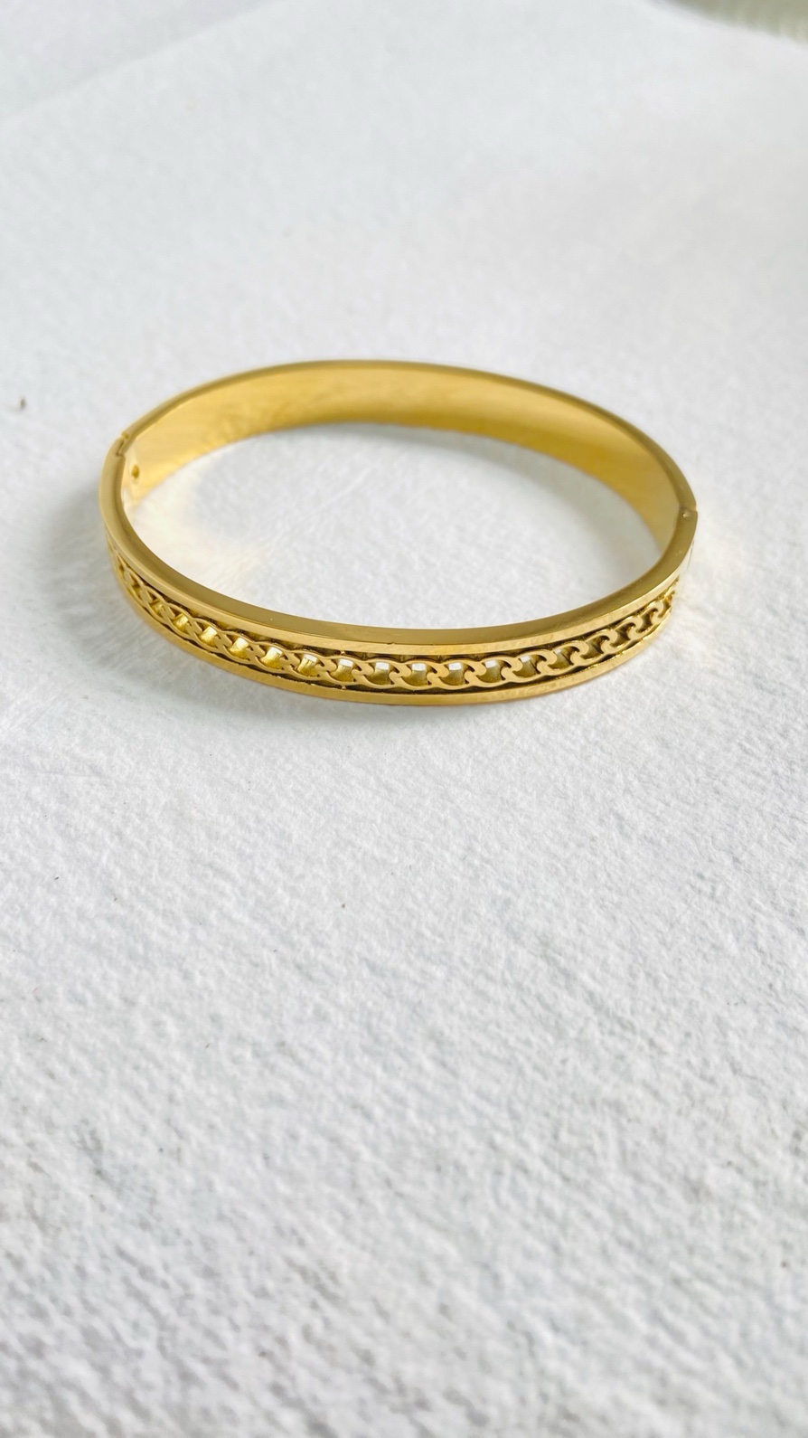 Sleek gold bangle with an intricate chain-link design - Image 2
